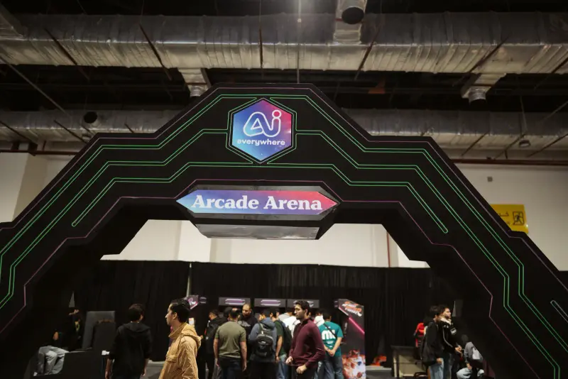 Neon Arcade Arena gate with visitors beyond, Connecta 2025
