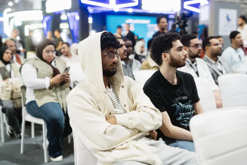 Engaged young audience listening at an Innovation Arena session, Connecta 2025
